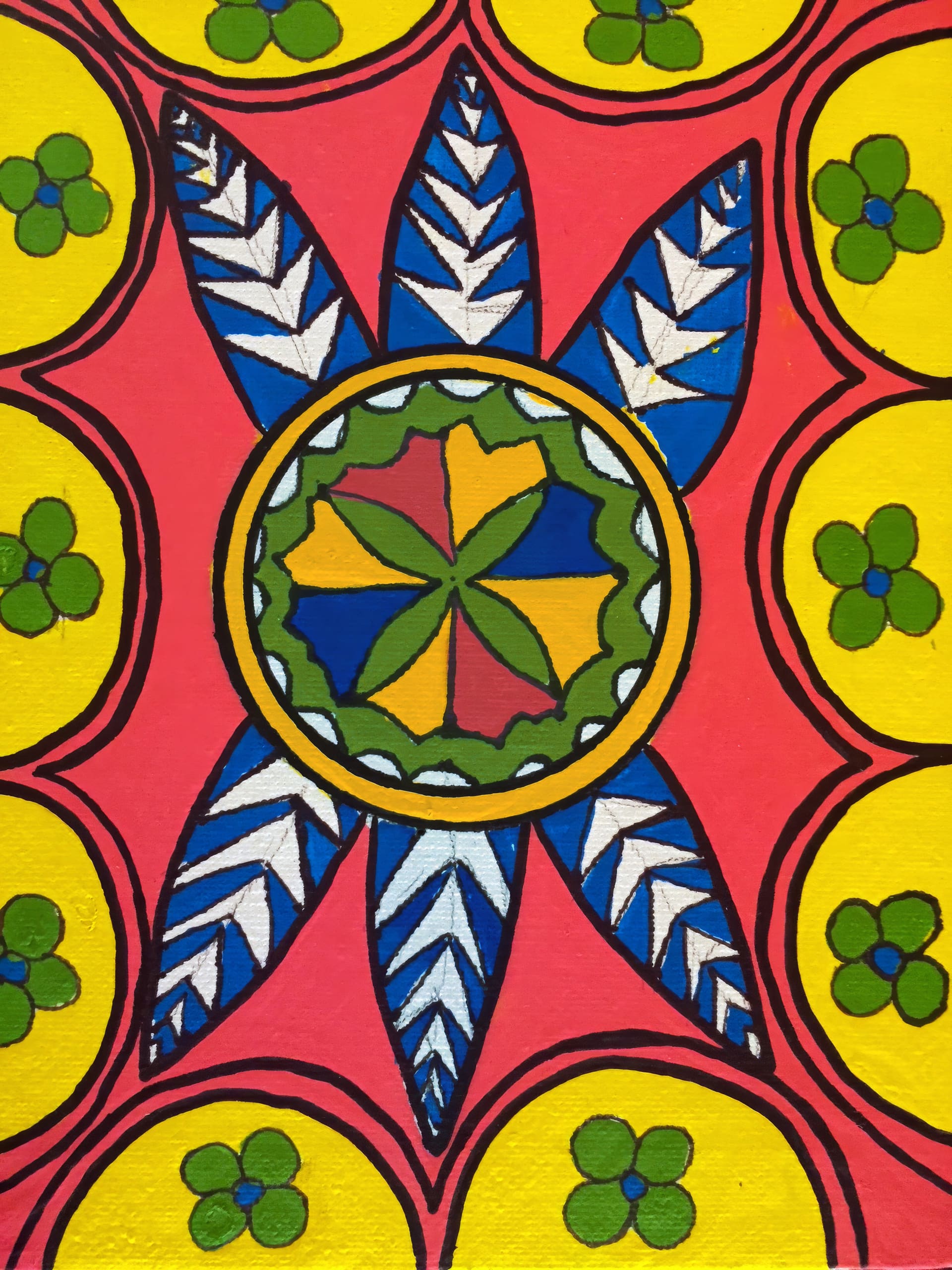 A colourful folk art design featuring a central green, blue, yellow, and red flower-like shape, surrounded by blue and white leaf patterns. The background is pink with a border of yellow circles, each containing a green four-petal flower.