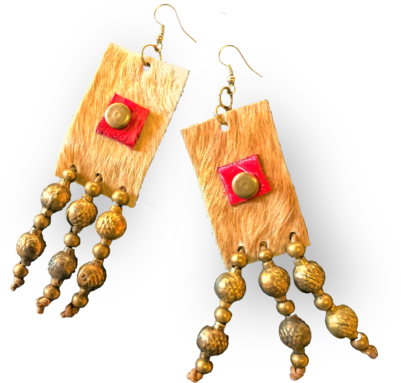 A pair of handmade earrings with rectangular tan leather pieces, each featuring a red square accent with a gold stud. Three dangling strands of round and textured gold beads hang from each earring. Gold hooks are attached at the top. The background is black.
