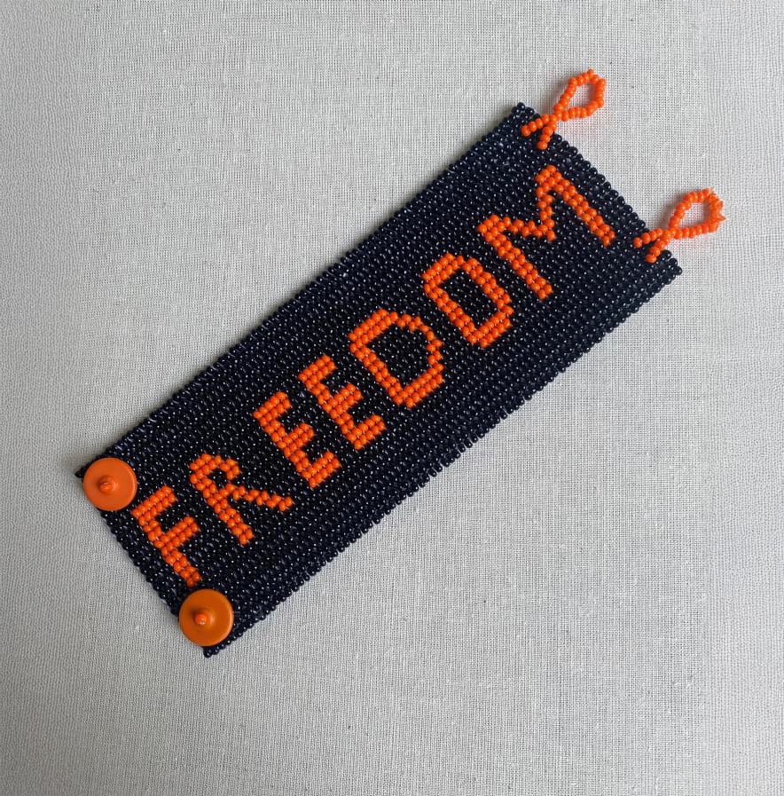 A beaded bracelet with the word 