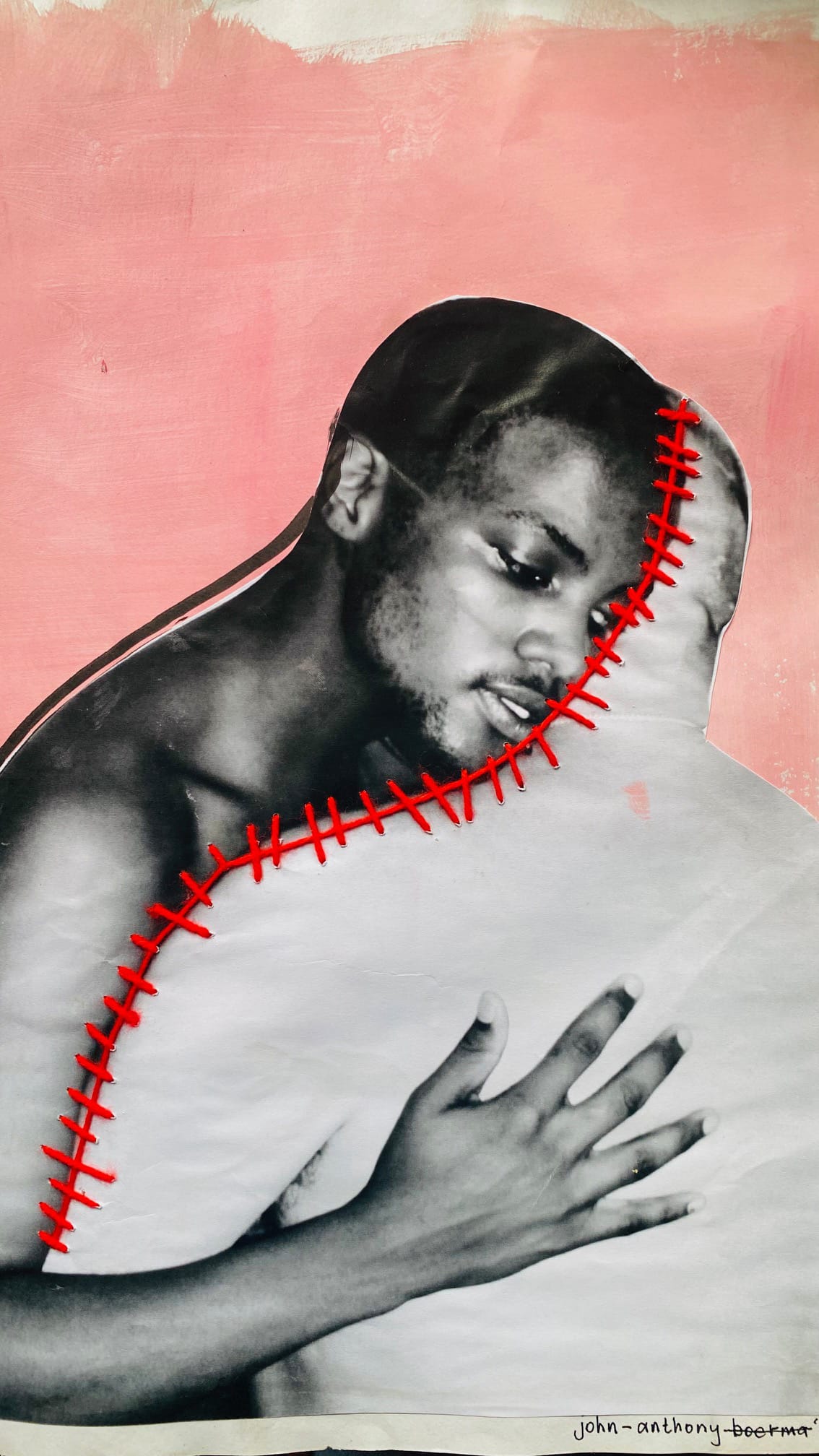 A Black man hugs a large white shape, both outlined and joined by visible red stitching. The background is pink, and the stitching seems to heal or connect the figures. The artist's signature, “john-anthony-boerma,” appears at the bottom right.