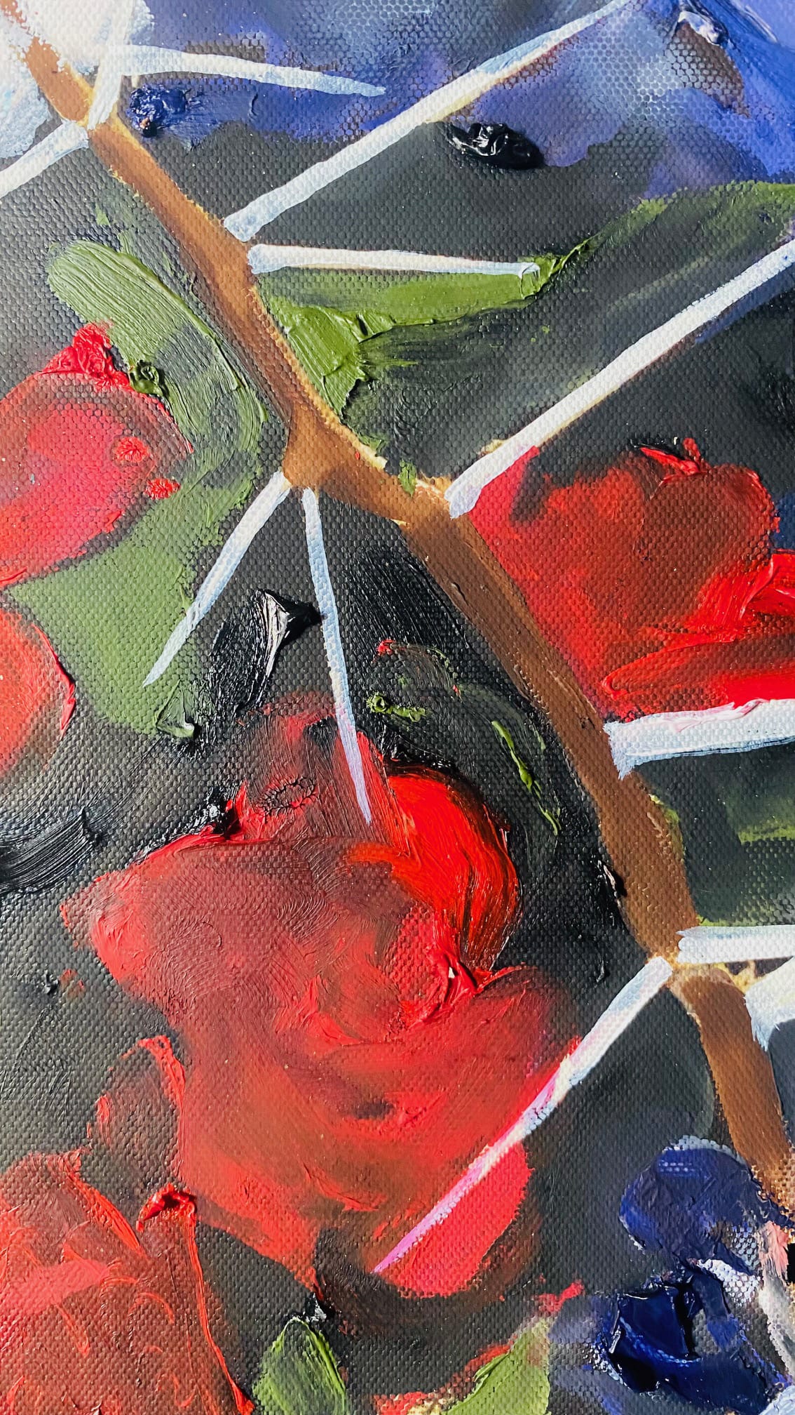 Close-up of an abstract painting showing thick brushstrokes in red, green, and blue, with textured paint. White diagonal lines intersect across the canvas, resembling thorns on a stem, surrounded by swirling, vibrant colours.
